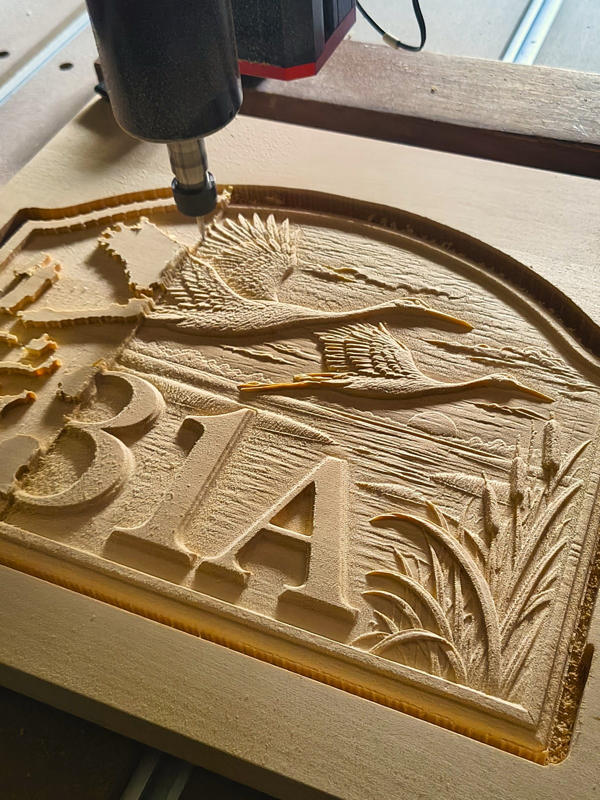 Cranes above the home — Wooden house number with cranes – facade plaque